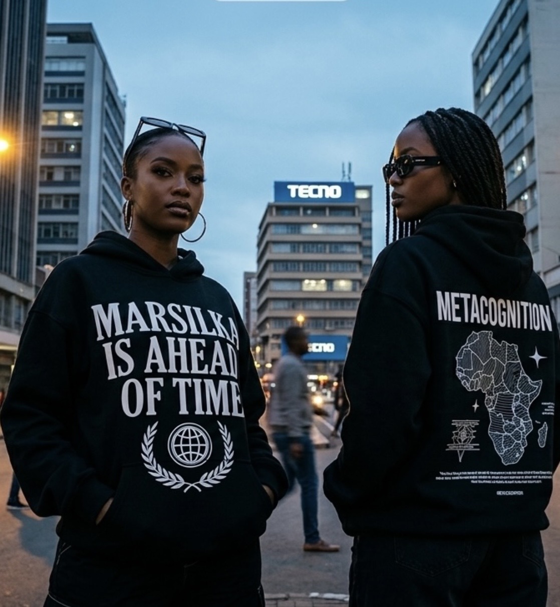 Models in MARSILKA Is Ahead Of Time hoodies on a city street at dusk